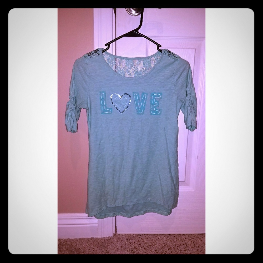 Juniors top with lace and sequins